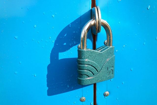 "Lock on blue wall"